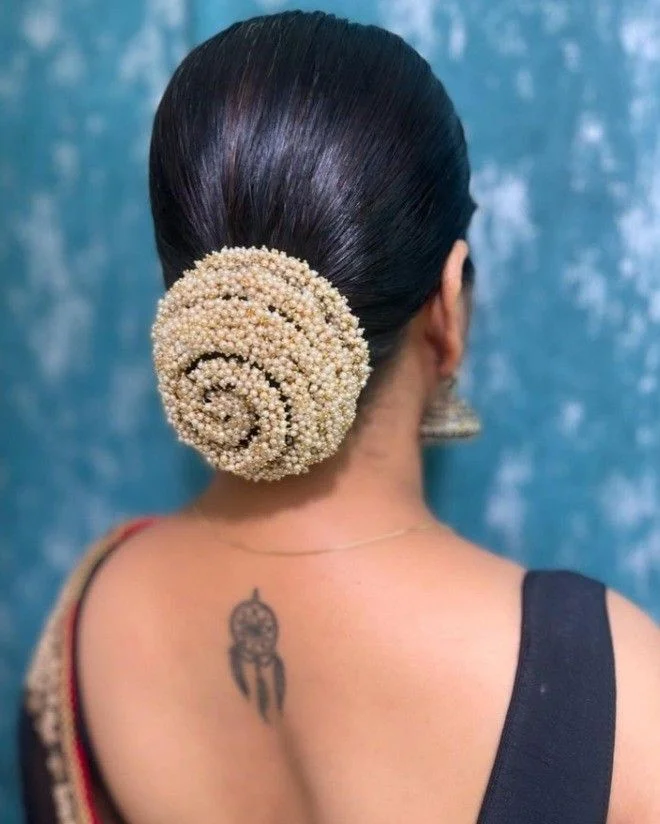 pearl bun hairstyle for brides